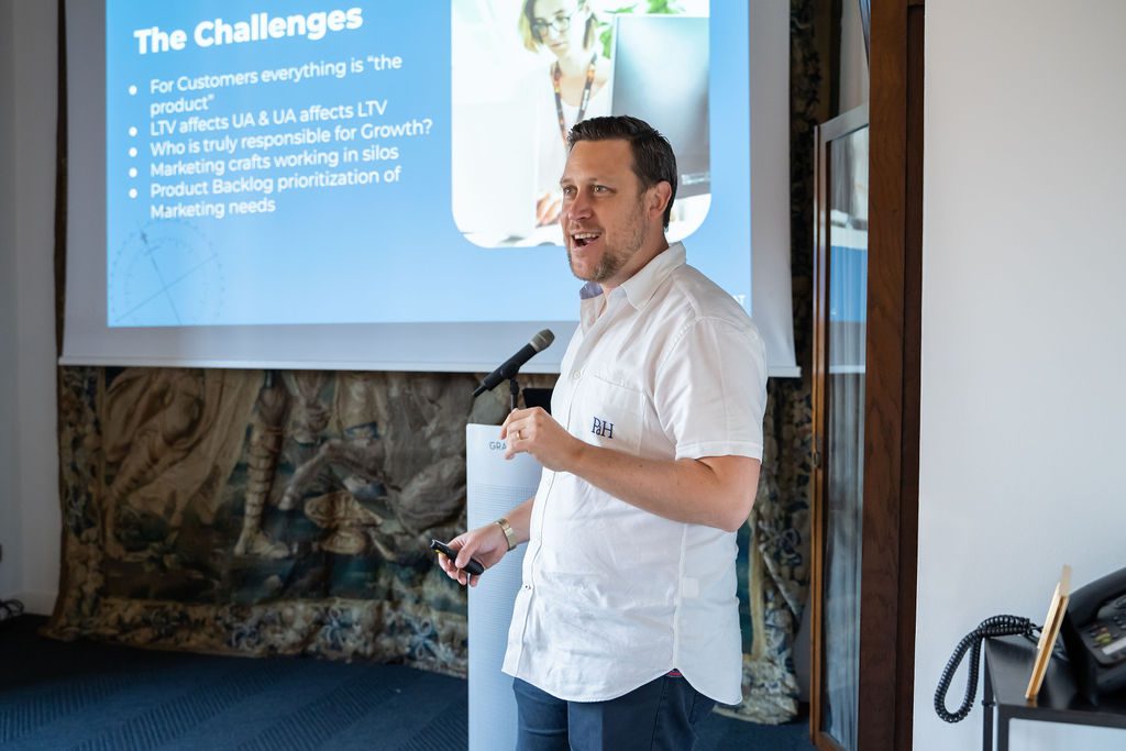 Mobile growth leaders talking on deck at a past GrowBoat
