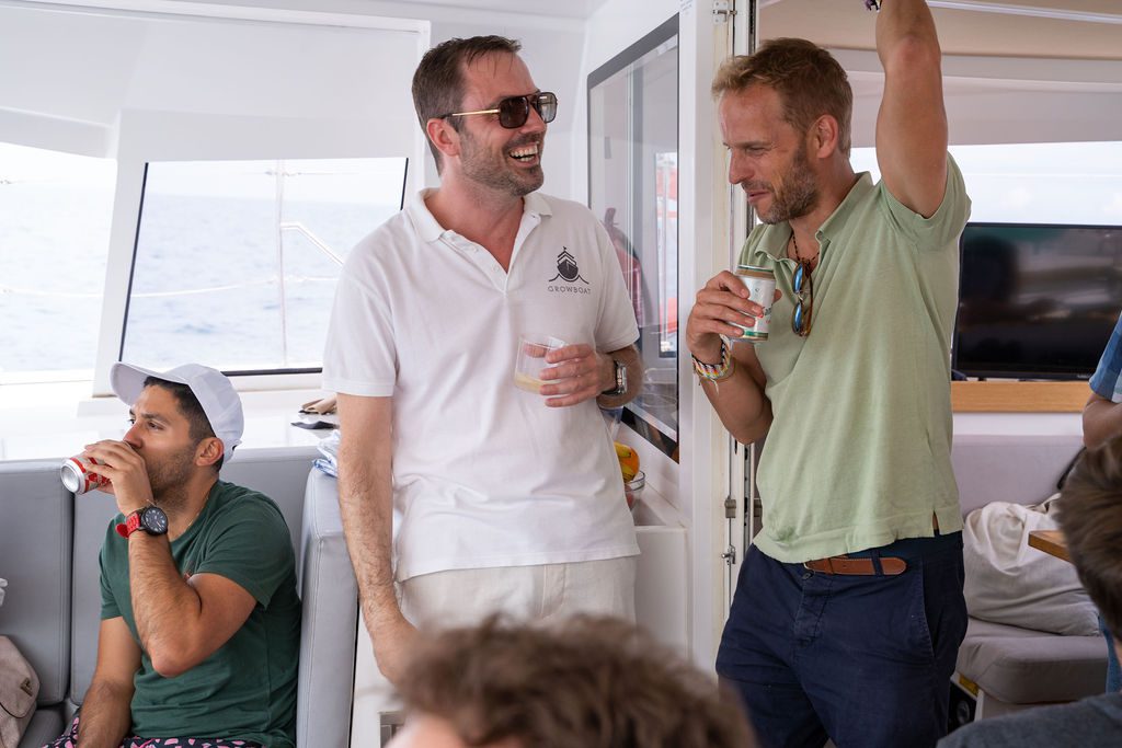 Mobile growth leaders talking on deck at a past GrowBoat