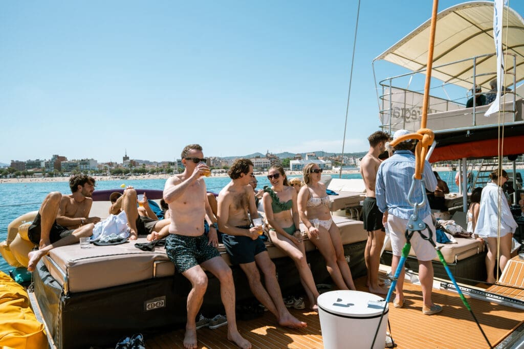 GrowBoat attendees celebrating a successful networking sailing event in Barcelona
