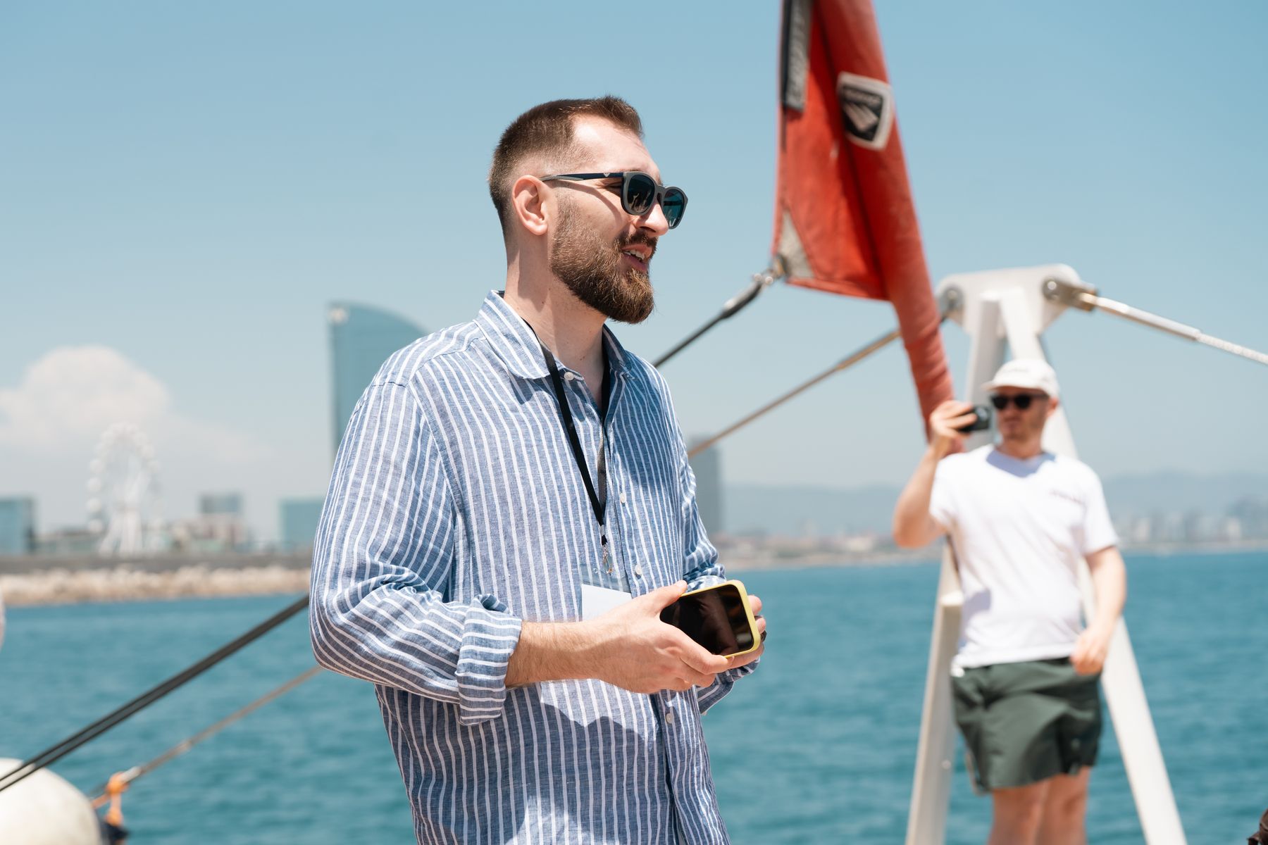 Friends and peers sharing a moment on the water at GrowBoat Barcelona