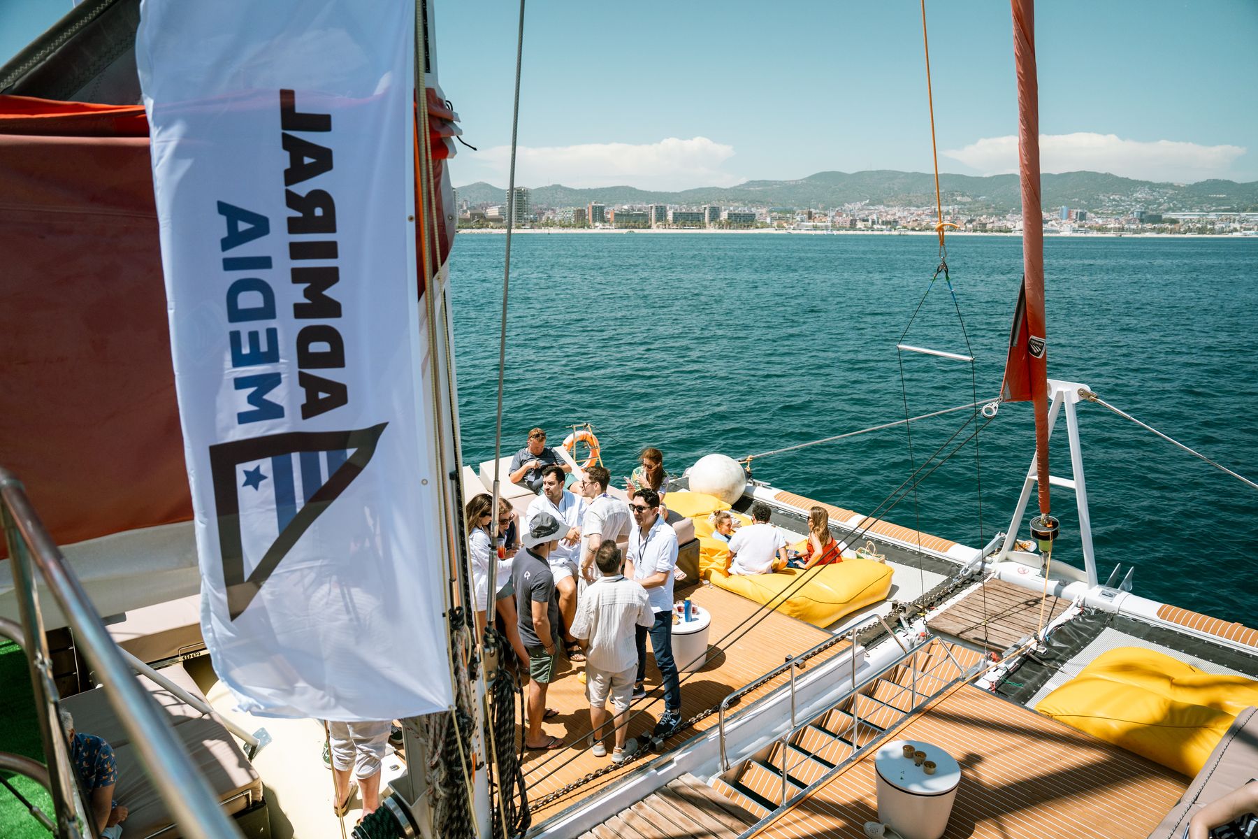 Friends and peers sharing a moment on the water at GrowBoat Barcelona