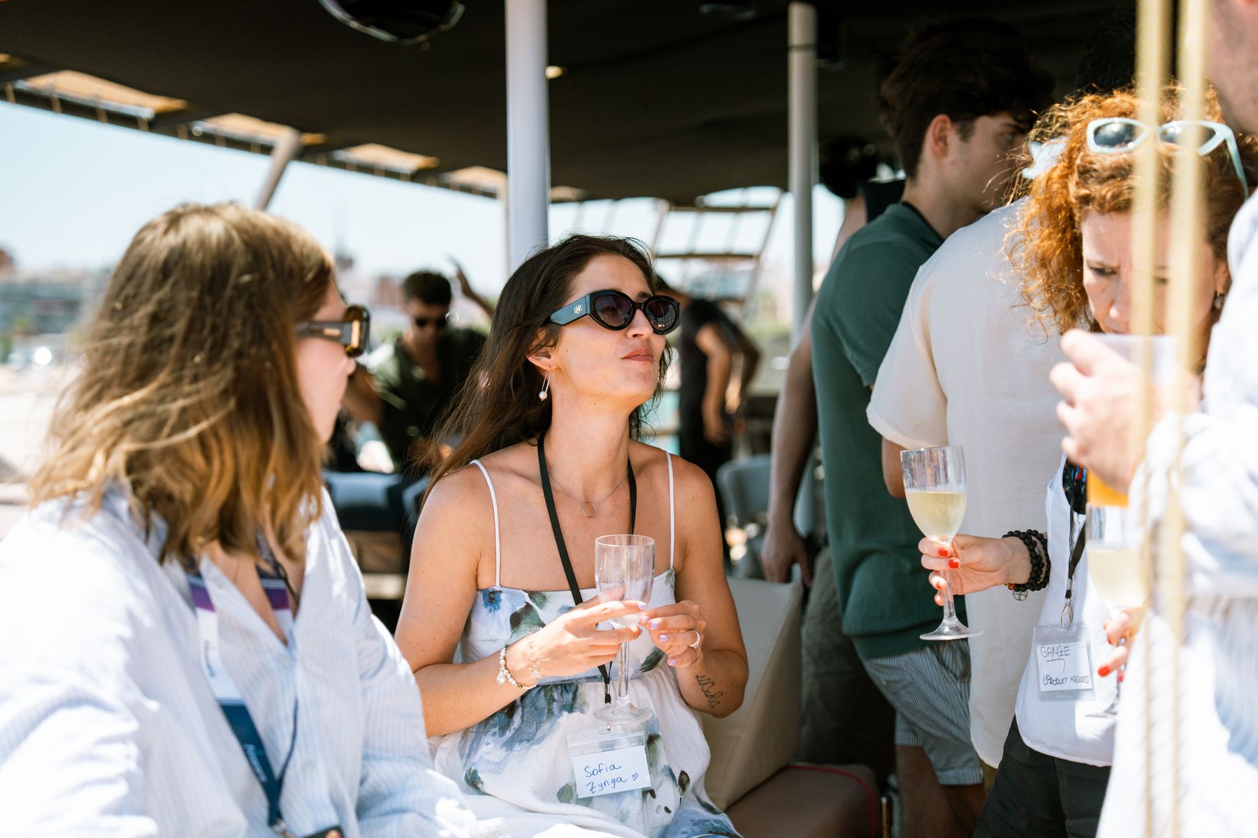 A small group in conversation on the GrowBoat catamaran