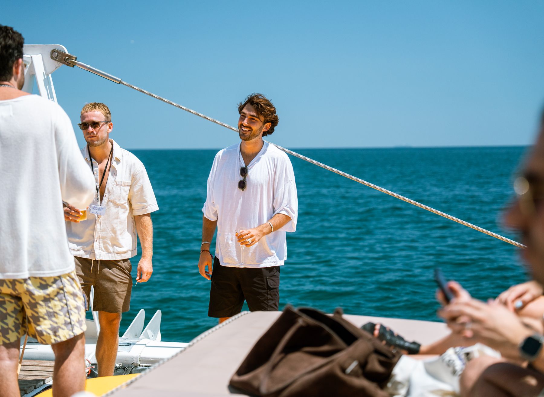Friends and peers sharing a moment on the water at GrowBoat Barcelona