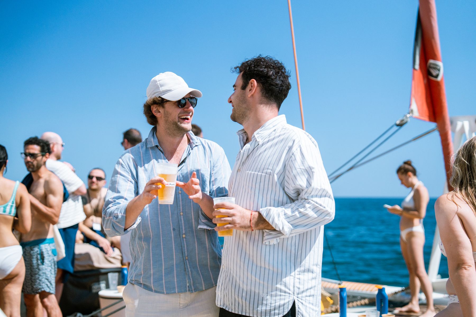 Mobile growth leaders talking in the sun aboard GrowBoat Barcelona